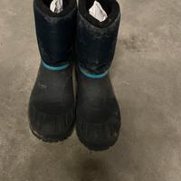 Dopo sci scarponi neve donna e bambino