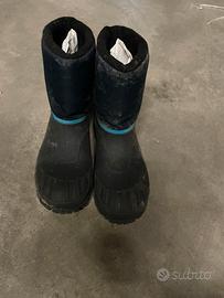 Dopo sci scarponi neve donna e bambino