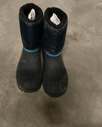 Dopo sci scarponi neve donna e bambino