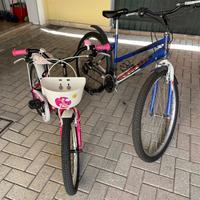 Biciclette per uomo e bambina