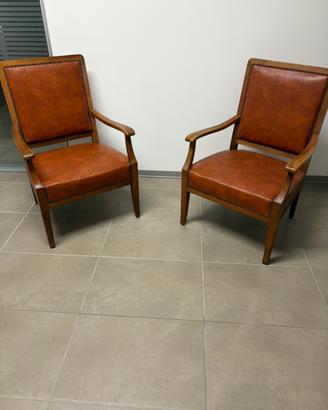 Coppia di poltrone in legno e pelle