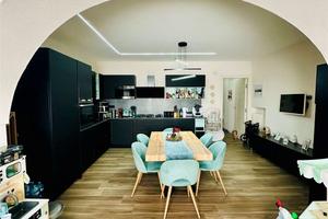 TRILOCALE CON GIARDINO PRIVATO