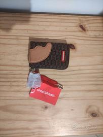portafoglio sprayground 