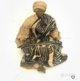 SCULTURA DI GIOVANE ARABO IN VARI MATERIALI