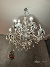 lampadario e due lumini da comodino