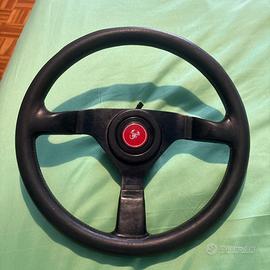 Volante Momo Ferrari originale 11/81.