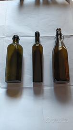 n.3 bottiglie per l'olio vuote in vetro.