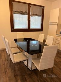 Tavolo da pranzo moderno  in vetro con 6 sedie