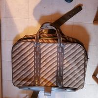 2 valigie con fantasie a striscie