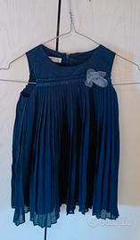 abito elegante blu con fiore 