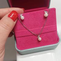 Completo argento e perline