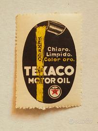 Chiudilettera pubblicitario "Texaco Motor Oil"