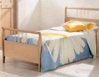 Letto in legno color noce
