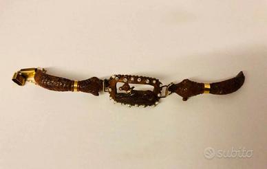 Bracciale in oro e legno con rappresentazione