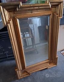 Specchio da parete con cornice in legno dorato 