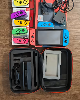 Nintendo Switch + 3 paia di Joy con + accessori