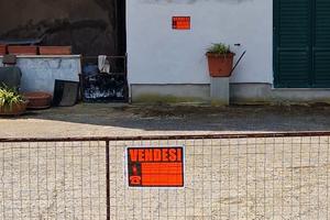 Terreno con immobile