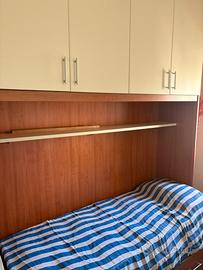 Armadio a ponte con letto