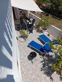 Appartamento con veranda coperta e cortile interni