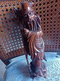 Antica statua giapponese in legno