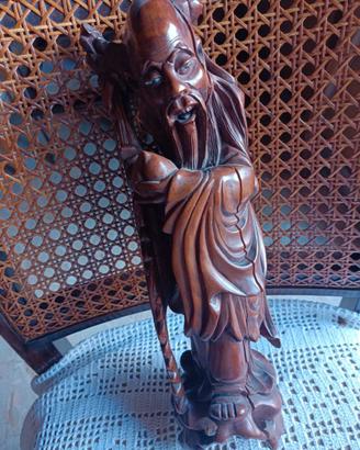 Antica statua giapponese in legno