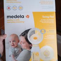 tira latte medela e indossabile seggiolino auto 
