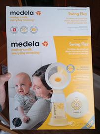 tira latte medela e indossabile seggiolino auto 