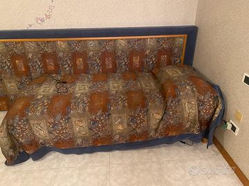 Letto singolo con doghe che si alzano elettricamen