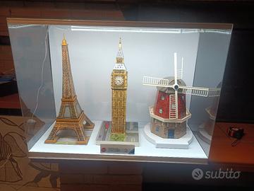 tre puzzle 3D Ravensburger in teca con luce