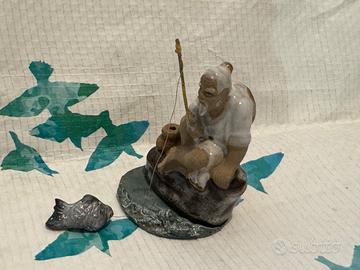 2 Statuine – Pescatore Orientale e Tartaruga