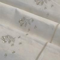 lenzuolo ricamato a mano