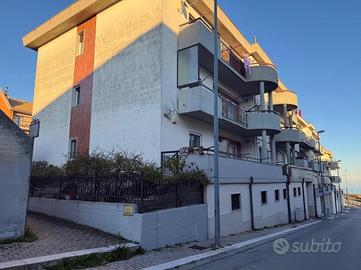 Appartamento con giardino e box