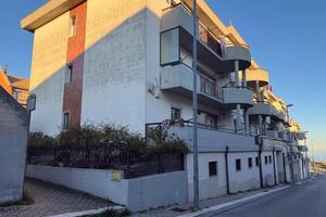 Appartamento con giardino e box