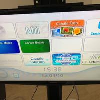 Nintendo Wii completa + 2 telec, volanti e 1o gioc