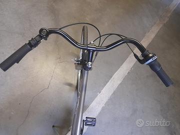 Bicicletta con seggiolino