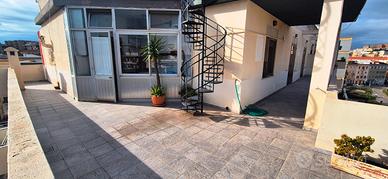 Attico con terrazza a livello zona Tribunale