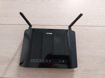 Modem D-Link DSL-2740B completo di alimentatore.