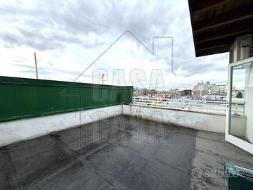 Elegante Attico Trilocale con Terrazzo Privato in