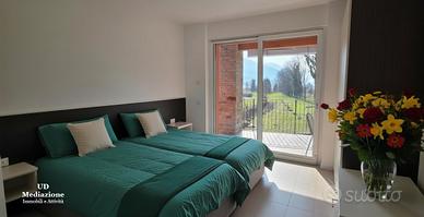 Meraviglioso appartamento con giardino e piscina