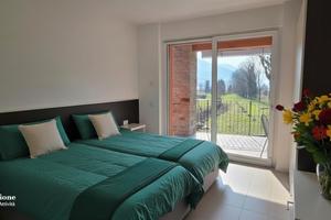 Meraviglioso appartamento con giardino e piscina