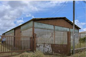 Capannone con adiacente abitazione