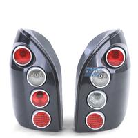 FANALI PER OPEL ZAFIRA A 99-05 HELLA NERO