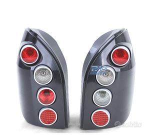 FANALI PER OPEL ZAFIRA A 99-05 HELLA NERO