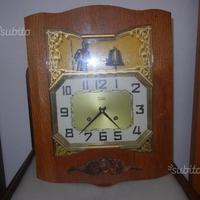 Orologio a muro tipo a pendolo