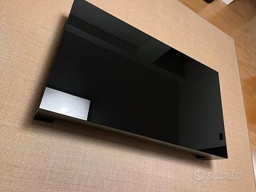 Tavolino salotto 140x89 vetro nero lucido