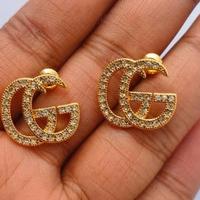 orecchini d'oro gucci