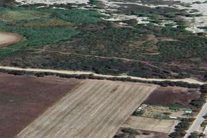 Capo Comino Terreno a due passi dal mare.
