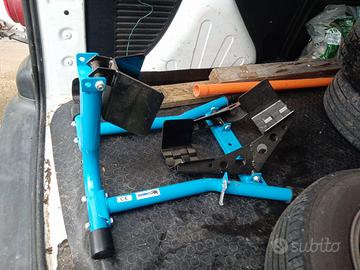 ferma moto per carrelli 