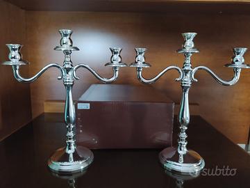 Coppia di candelabri in argento 800 massiccio