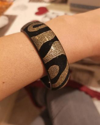 Bracciale nero e dorato